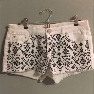 white with black design short shorts